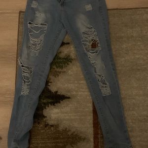 Worn but clean ripped jeans